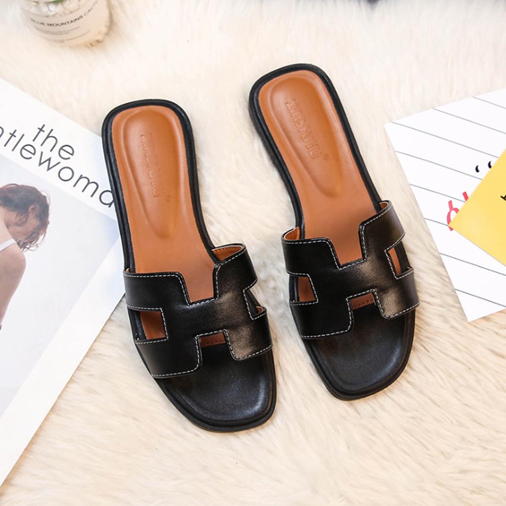 Leren Slippers met Iconisch H-Motief