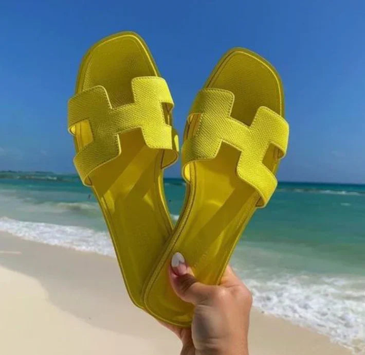 Leren Slippers met Iconisch H-Motief