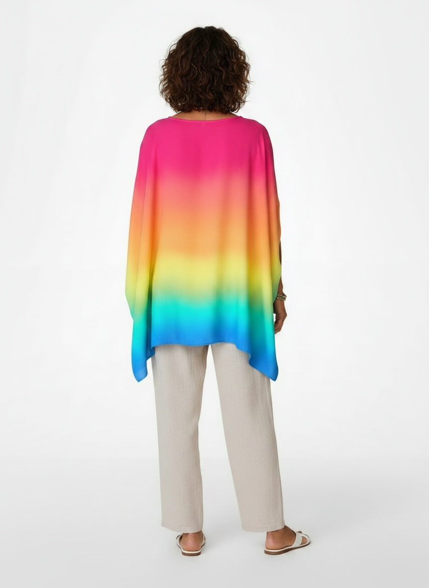 Back pose of the model wearing Asymmetrische Poncho-blouse met V-hals