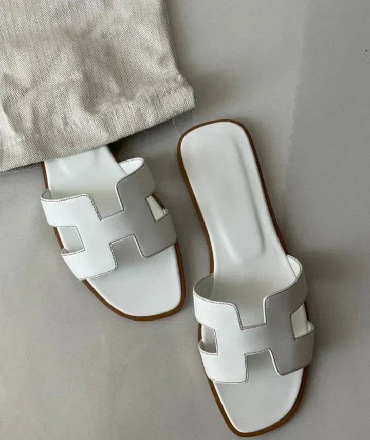Leren Slippers met Iconisch H-Motief