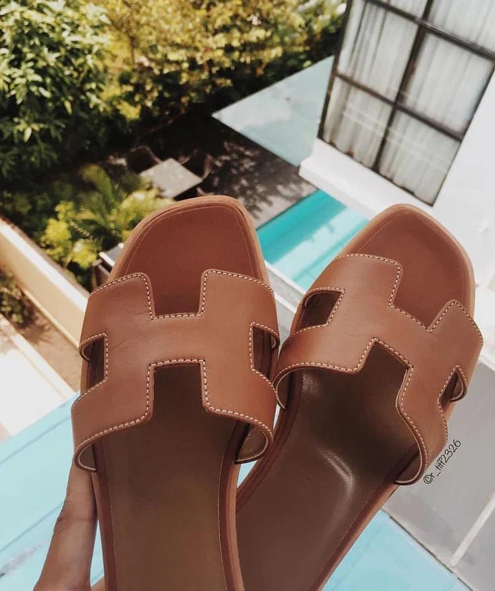 Leren Slippers met Iconisch H-Motief