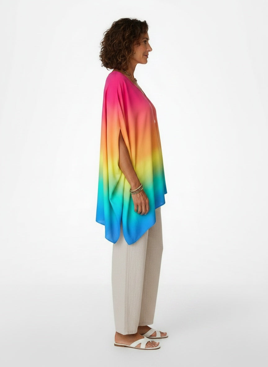 Side profile of the model wearing Asymmetrische Poncho-blouse met V-hals