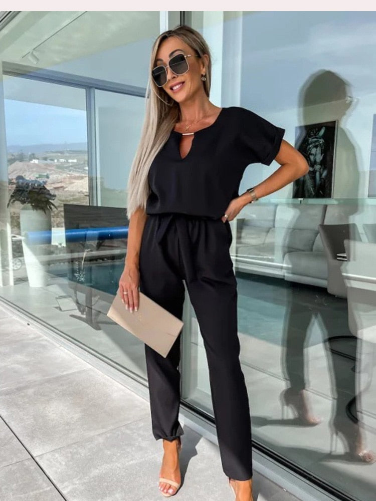 Getailleerde Jumpsuit met Strikceintuur