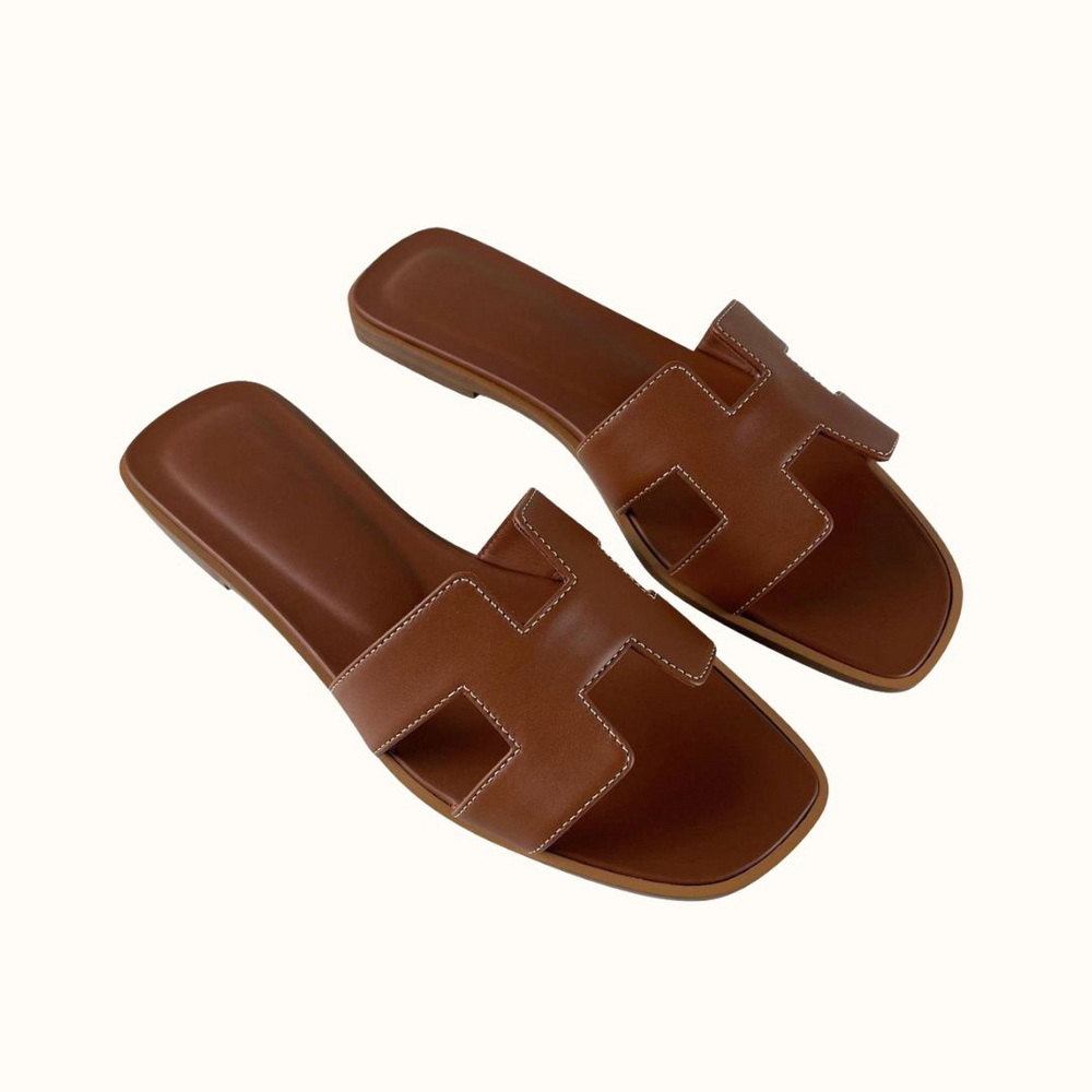 Leren Slippers met Iconisch H-Motief